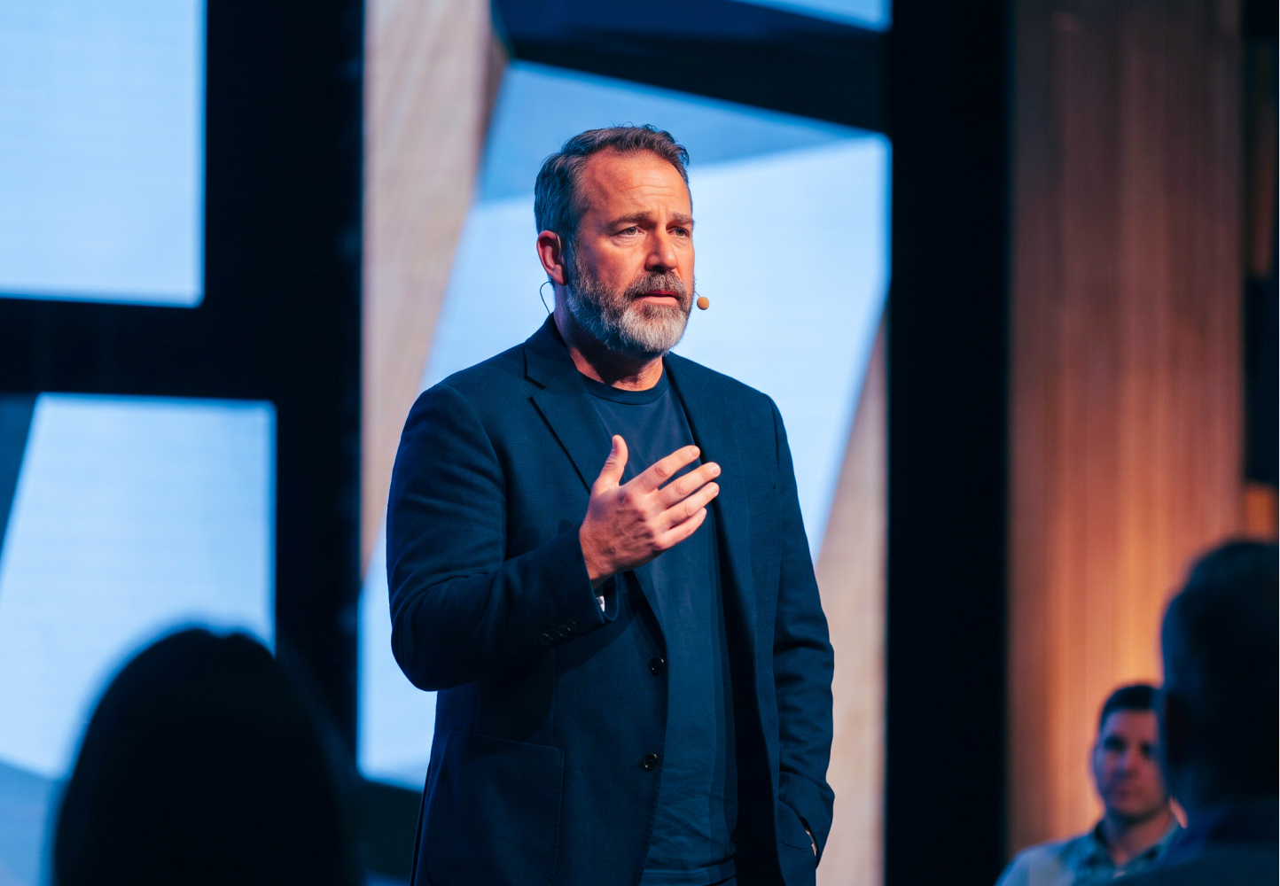 A keynote speaker addressing a corporate audience